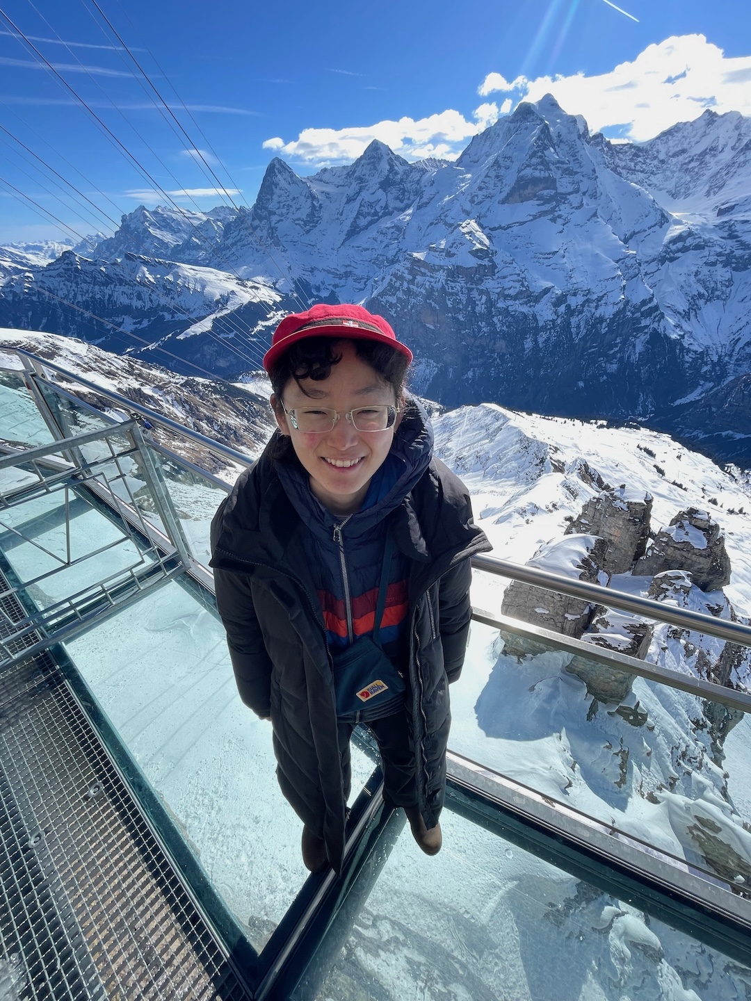 I believe in sidequesting as much as possible, and got to do a lot of it while studying abroad! This is me hiking on a glass floor thrill walk in the Swiss Alps...